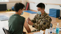 US military requires flu vaccine for some after outbreak in Texas training center